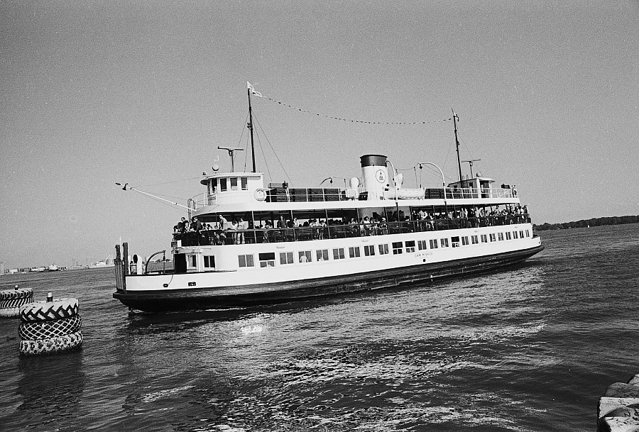 Toronto Islands ferry approaching Toronto dock to take on gay picnic passengers