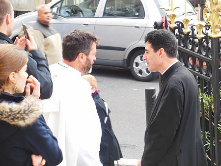 Priests on steps of St.Vincent de Paul aka Les Reformes church Marseille